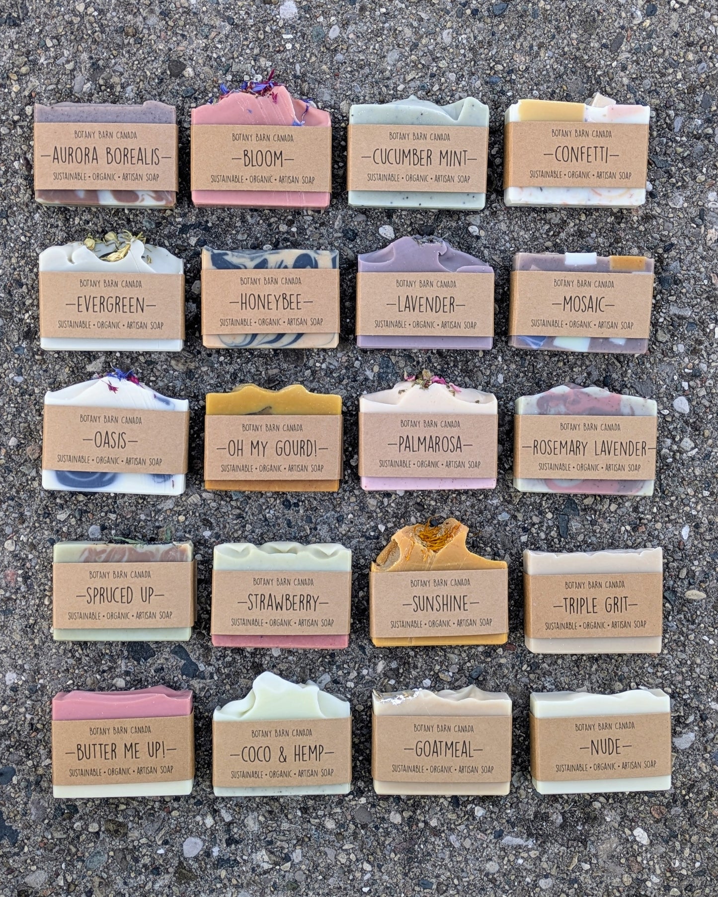 Colourful handmade soap bars with Botany Barn branding laid out in a grid.