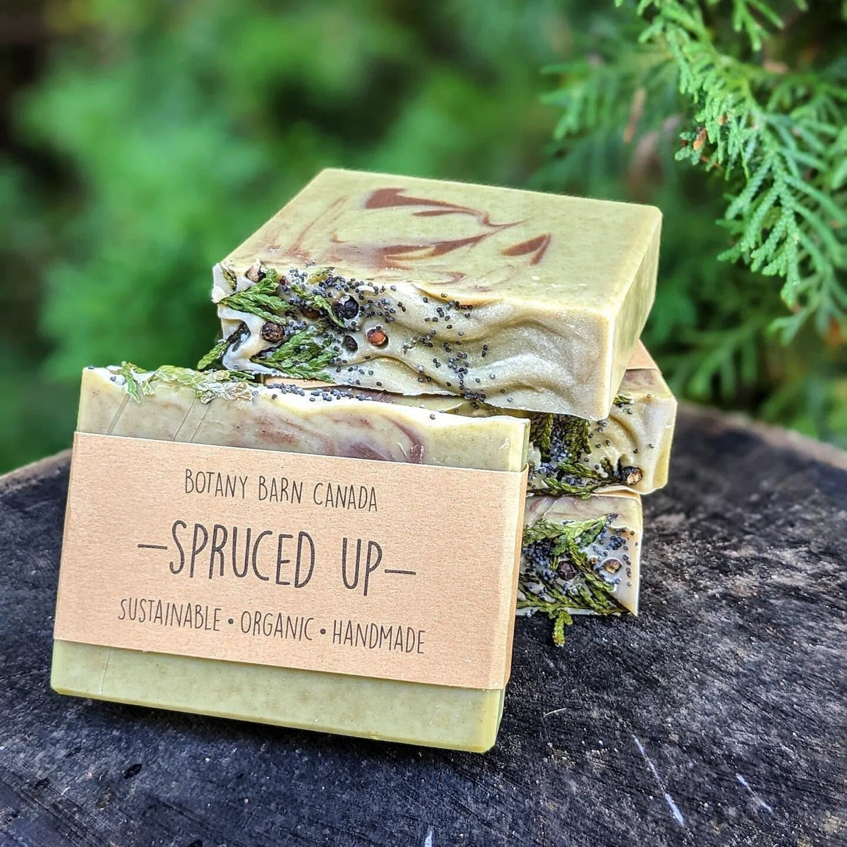 Stack of soap bars with a visible label on a natural background