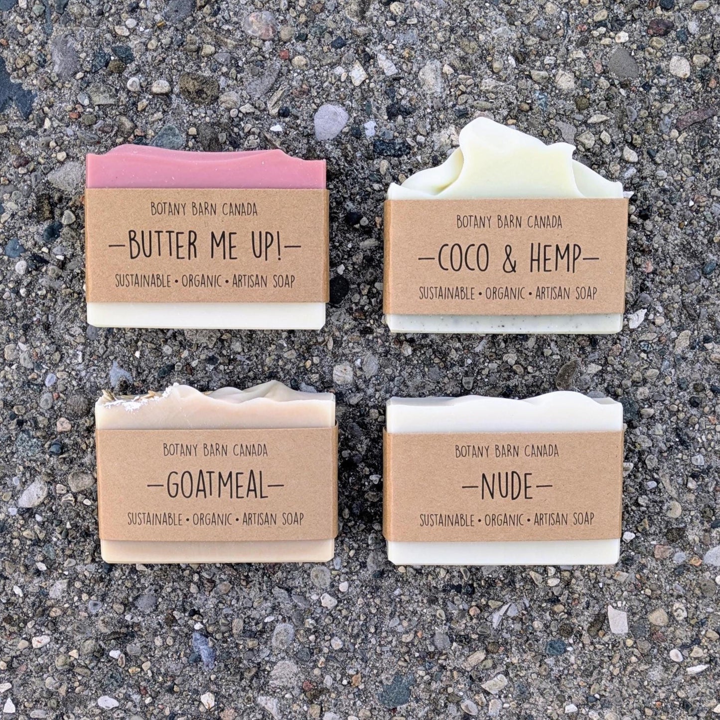 Four bars of Botany Barn Canada soap on a textured surface